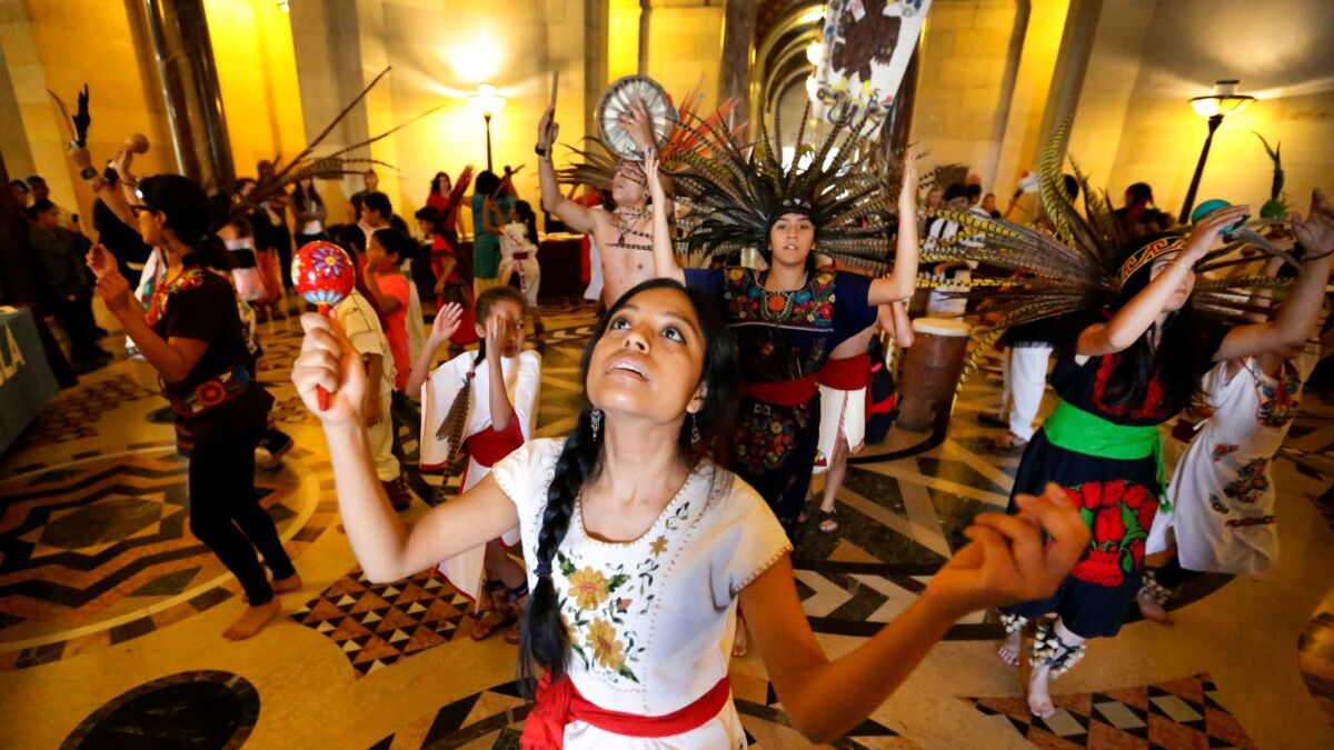 Griselda Herrera dances at City Hall in November in a celebration of Native American Heritage Month. Council members were considering the proposal to replace Columbus Day.
