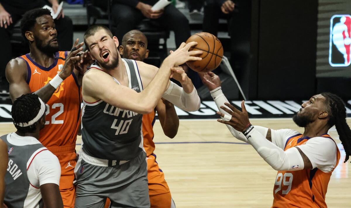 Clippers center Ivica Zubac is fouled by Suns forward Jae Crowder during Game 4.