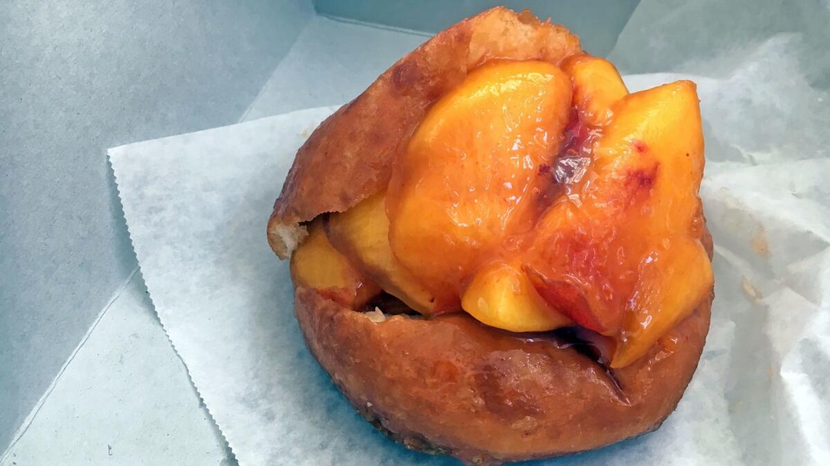 Peach doughnut from Donut Man. (Jenn Harris / Los Angeles Times)