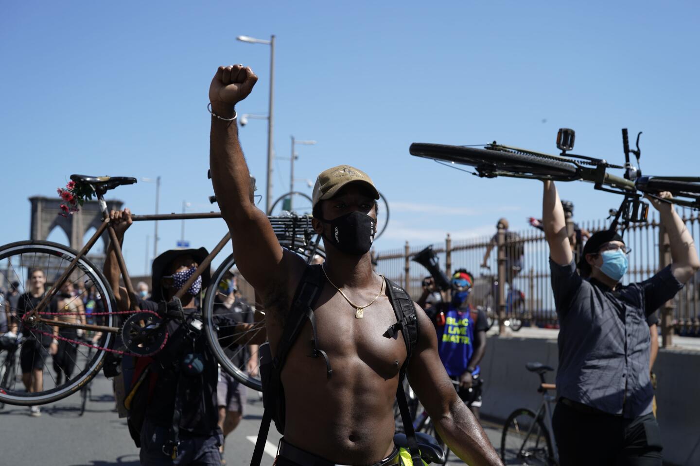 Protesters cross the Brooklyn Bridge during a Juneteenth rally in New York.