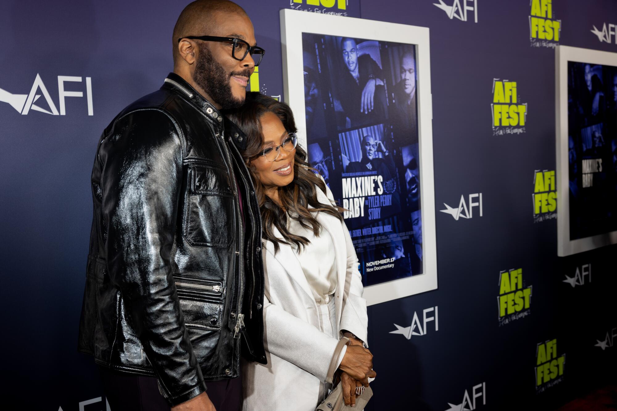 Entertainment moguls Tyler Perry and Oprah Winfrey, on the red carpet at TCL Chinese Theatre