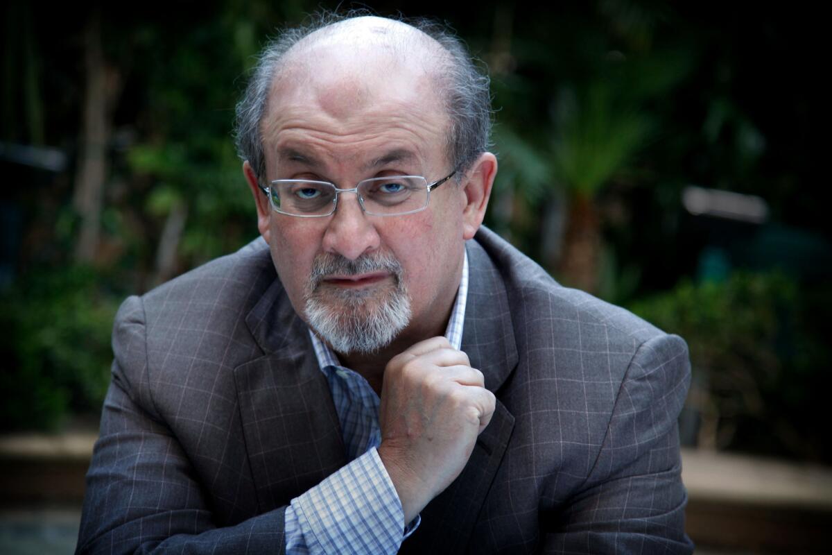 Author Salman Rushdie, pictured in 2013, strikes back after his word choice is criticized.