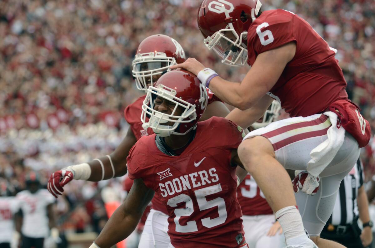 Oklahoma running back Joe Mixon (25) ran for touchdowns of 11 and 17 yards against Texas Tech during a game on Oct. 24.