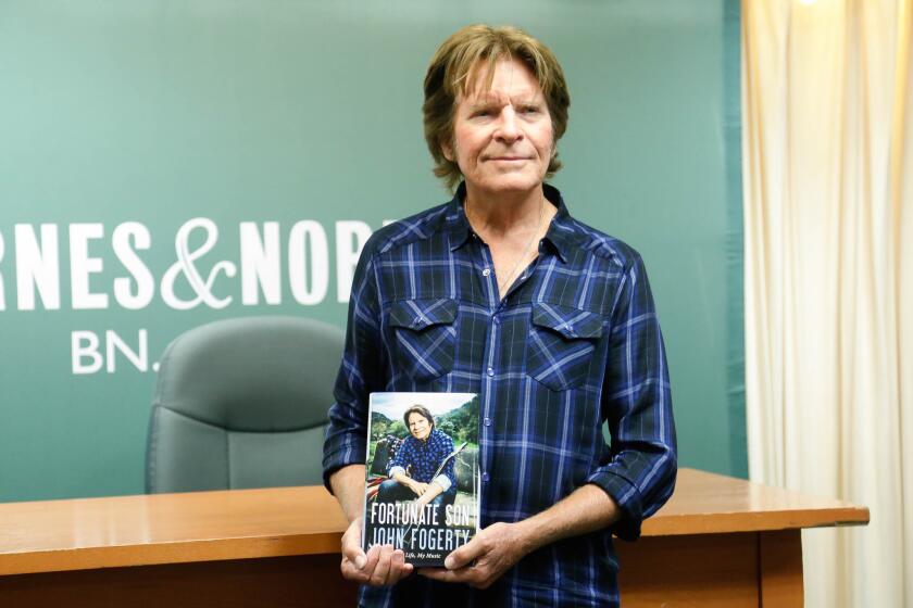 John Fogerty promotes his new book, "Fortunate Son: My Life, My Music" at Barnes & Noble Fifth Avenue on Oct. 8, 2015 in New York City.