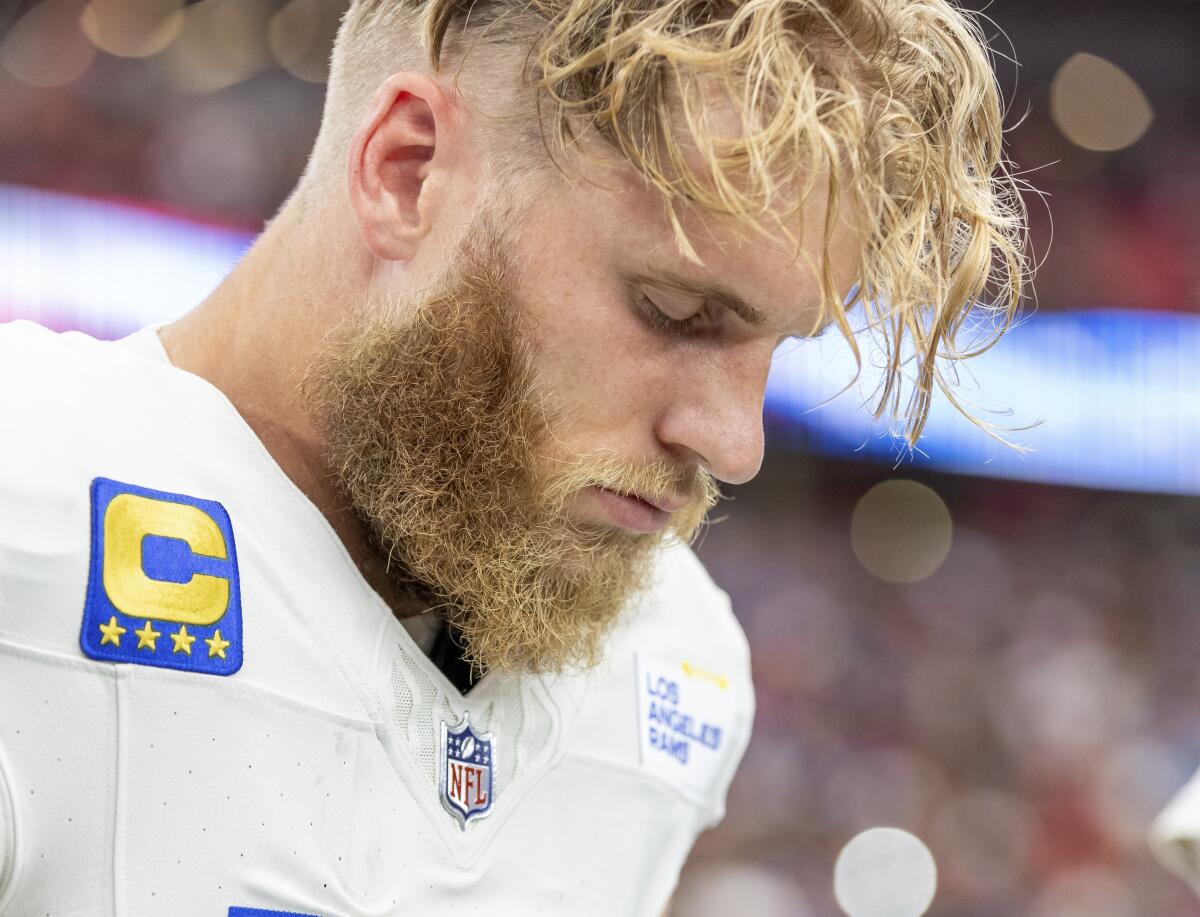 Rams wide receiver Cooper Kupp (10) hangs his head in Arizona before a game against the Cardinals.