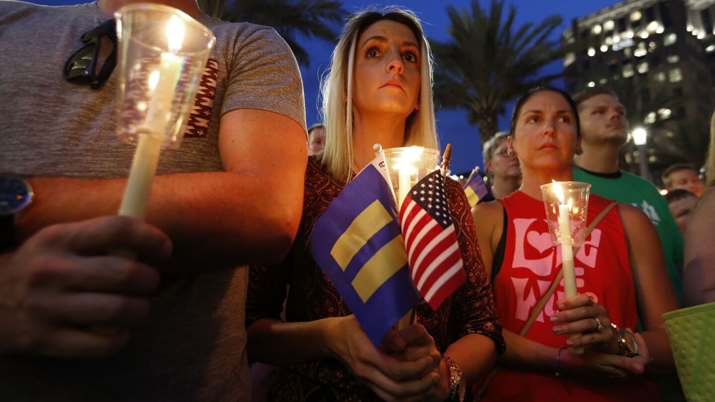 Thousands gather for a memorial rally at the Plaza at the Dr. Phillips Performing Arts Center in downtown Orlando on Monday to honor those killed and wounded in the Pulse nightclub attack.