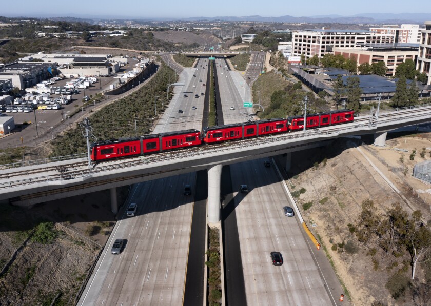 The Mid-Coast Extension of the UC San Diego Blue Line Trolley crosses I-5 on Nov. 21, 2021. 