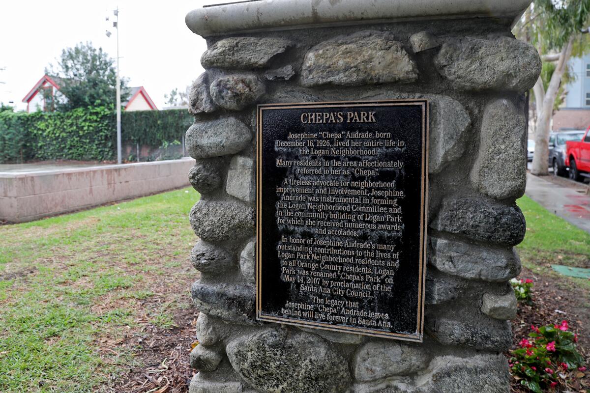 A plaque honors late Logan neighborhood activist Josephine "Chepa" Andrade at Chepa's Park in Santa Ana.