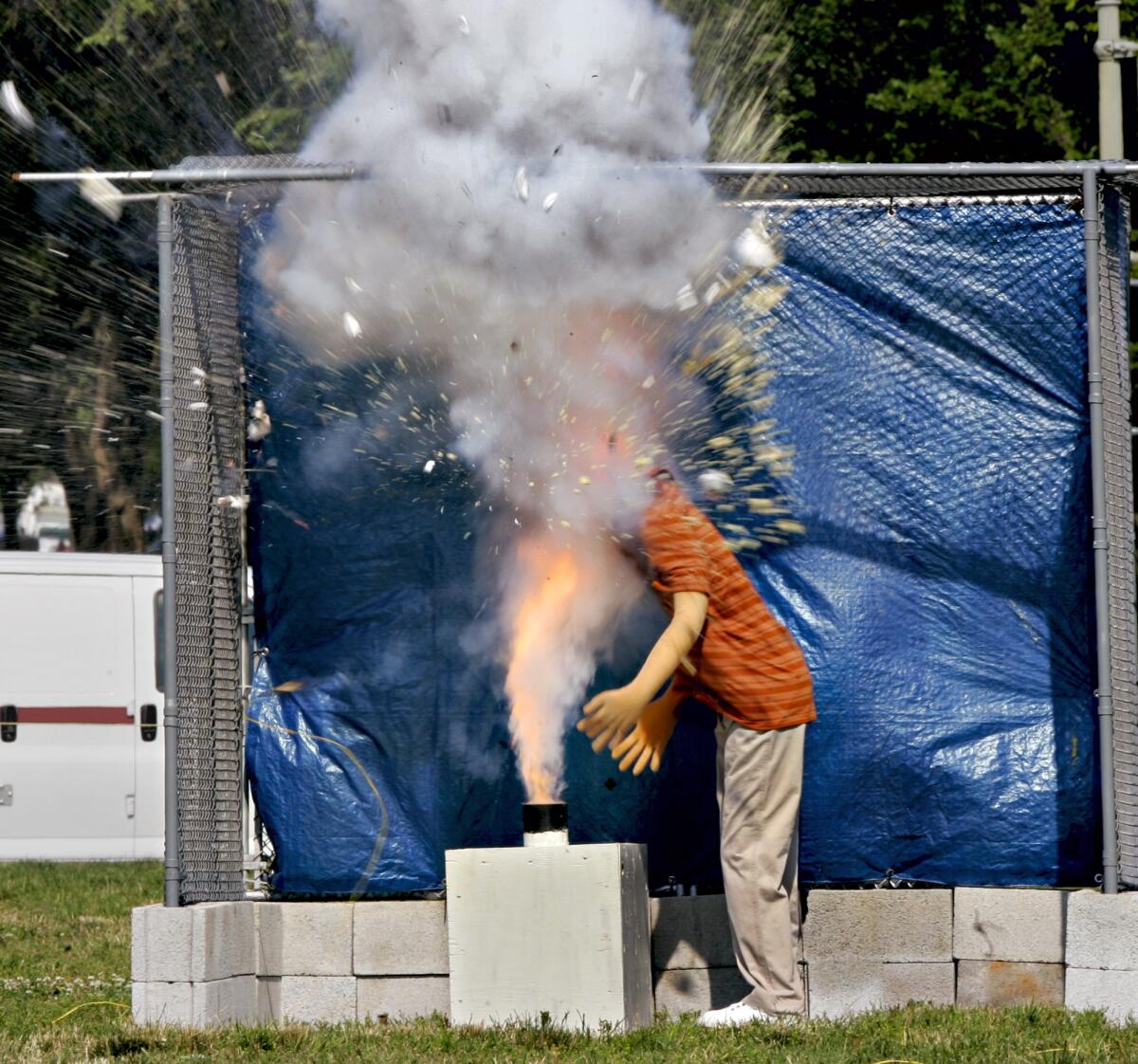 Flames shoot into a mannequin's head when fireworks ignite in a demonstration by the Consumer Products Safety Commission.