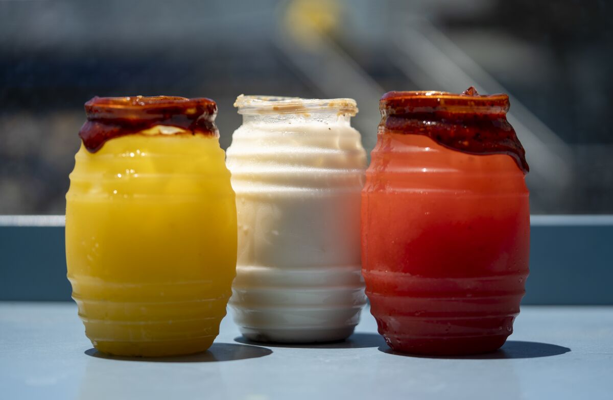Aguas frescas mango, horchata and strawberry kiwi located in the right field plaza at Dodger Stadium.