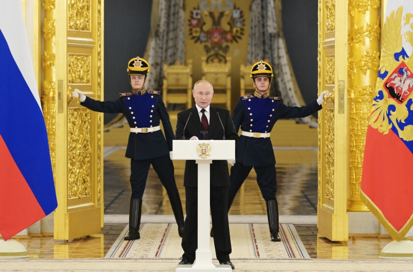 Russian President Vladimir Putin speaks during a ceremony to receive credentials from foreign ambassadors in Kremlin, in Moscow, Russia, Wednesday, Dec. 1, 2021. (Grigory Sysoev, Sputnik, Kremlin Pool Photo via AP)