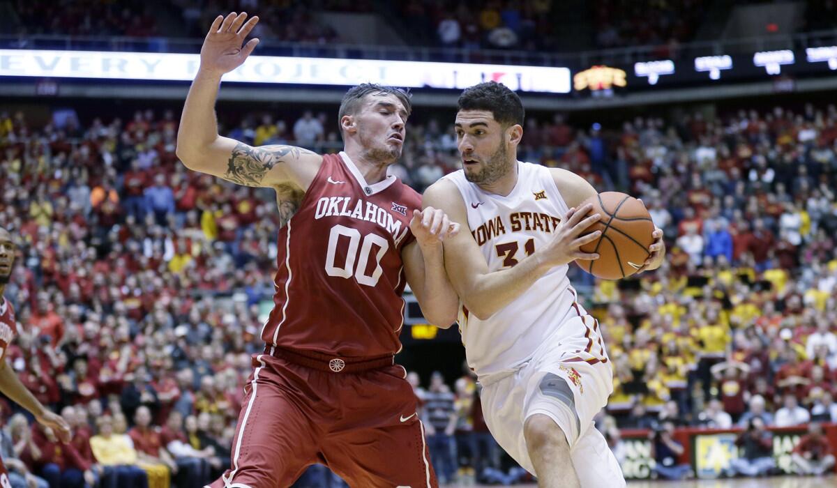 Iowa State forward Georges Niang, right, drives past Oklahoma forward Ryan Spangler during the second half on Monday.