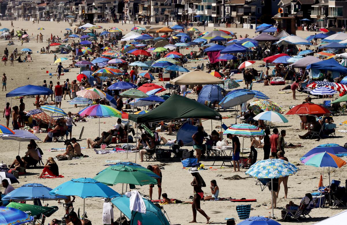 Southern California beaches were expected to be crowded Saturday as a heat wave bakes the region.
