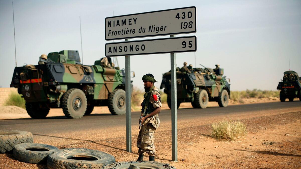 French armored vehicles head toward the Niger border in 2013. U.S. and French forces have spent years training and supporting the militaries of Mali, Niger and other countries to fight entrenched Islamic extremism.