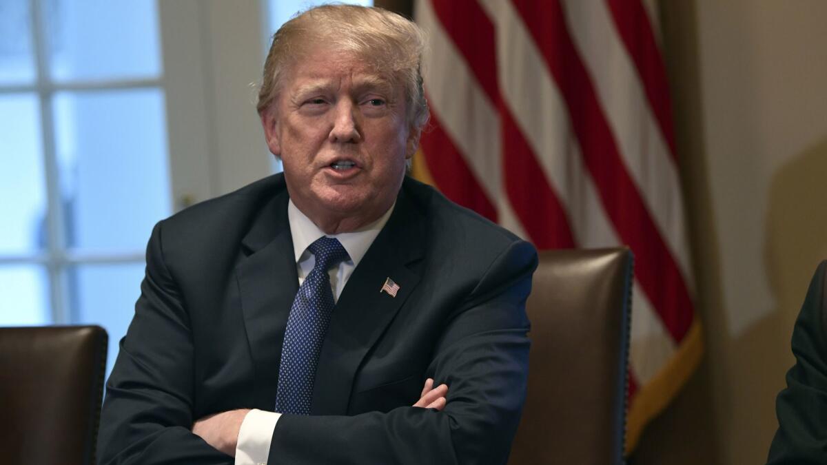 President Trump speaks in the Cabinet Room of the White House last month.