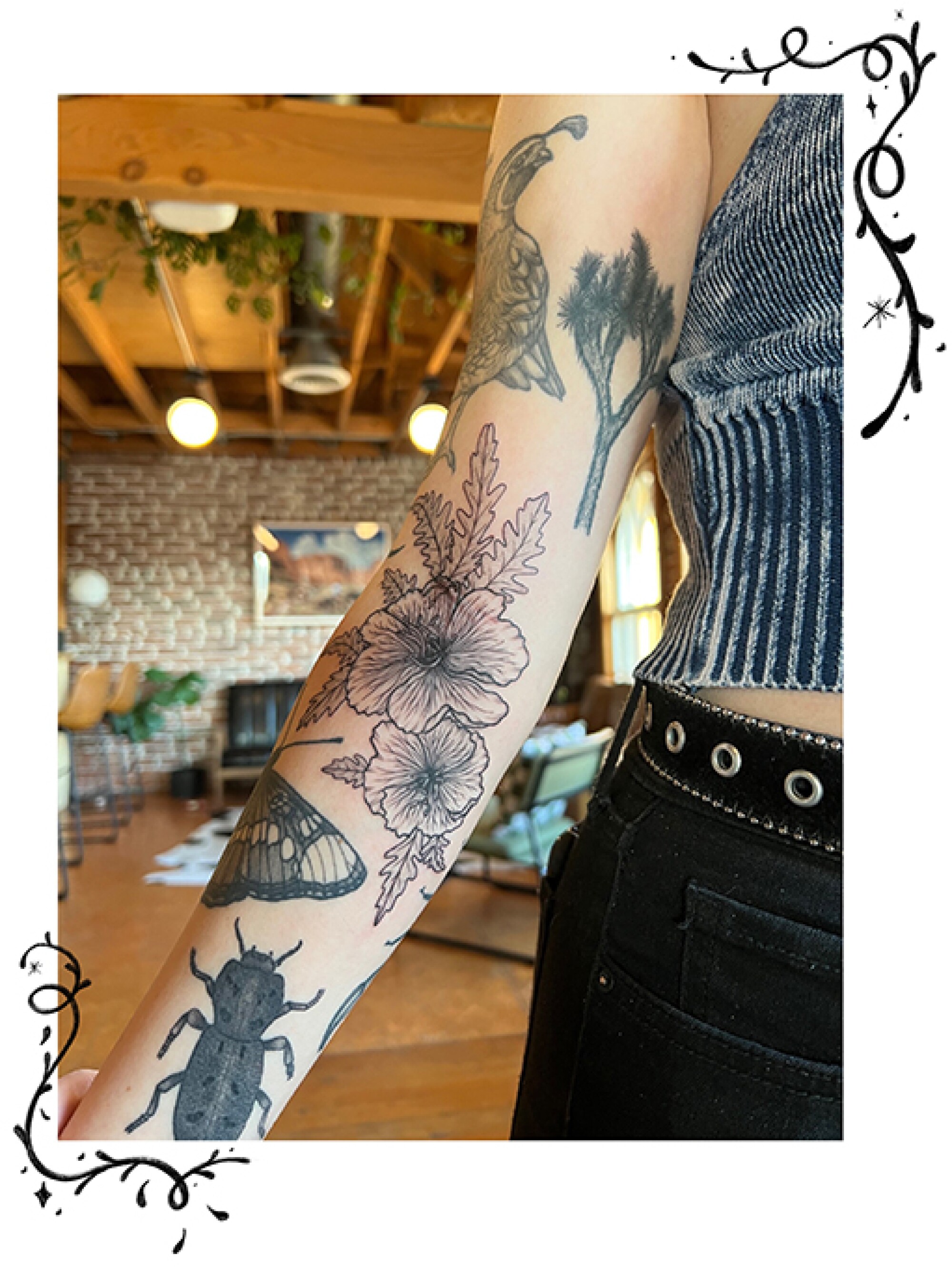 Evening primrose tattoo on an arm.