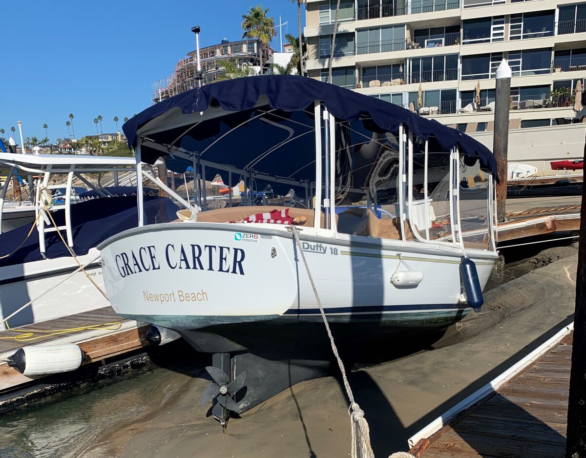 Sand choking the marina at Channel Reef lifted this Duffy boat completely out of the water.