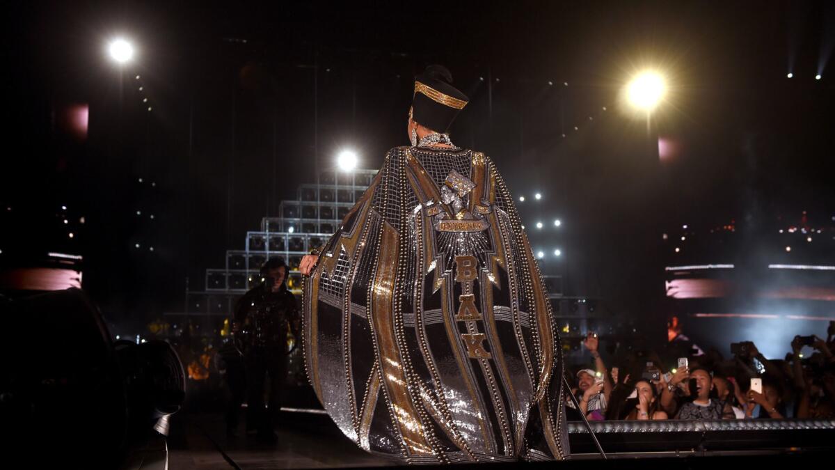 Beyoncé, onstage at Coachella on Saturday night, wears one of five custom looks created by Balmain creative director Olivier Rousteing in collaboration with Beyoncé's stylist, Marni Senofonte, and the singer herself.