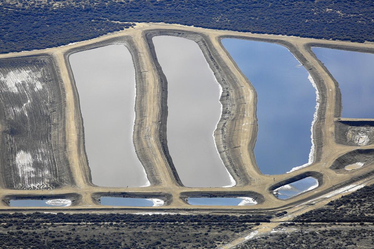 Pits containing wastewater from oil wells in Kern County.