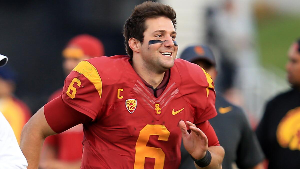 USC quarterback Cody Kessler runs off the field after the Trojans' win over Notre Dame on Nov. 29.