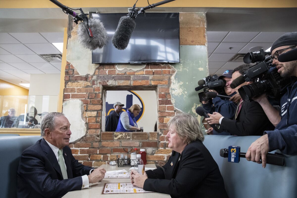 Democratic presidential candidate Mike Bloomberg meets with Nancy Guy