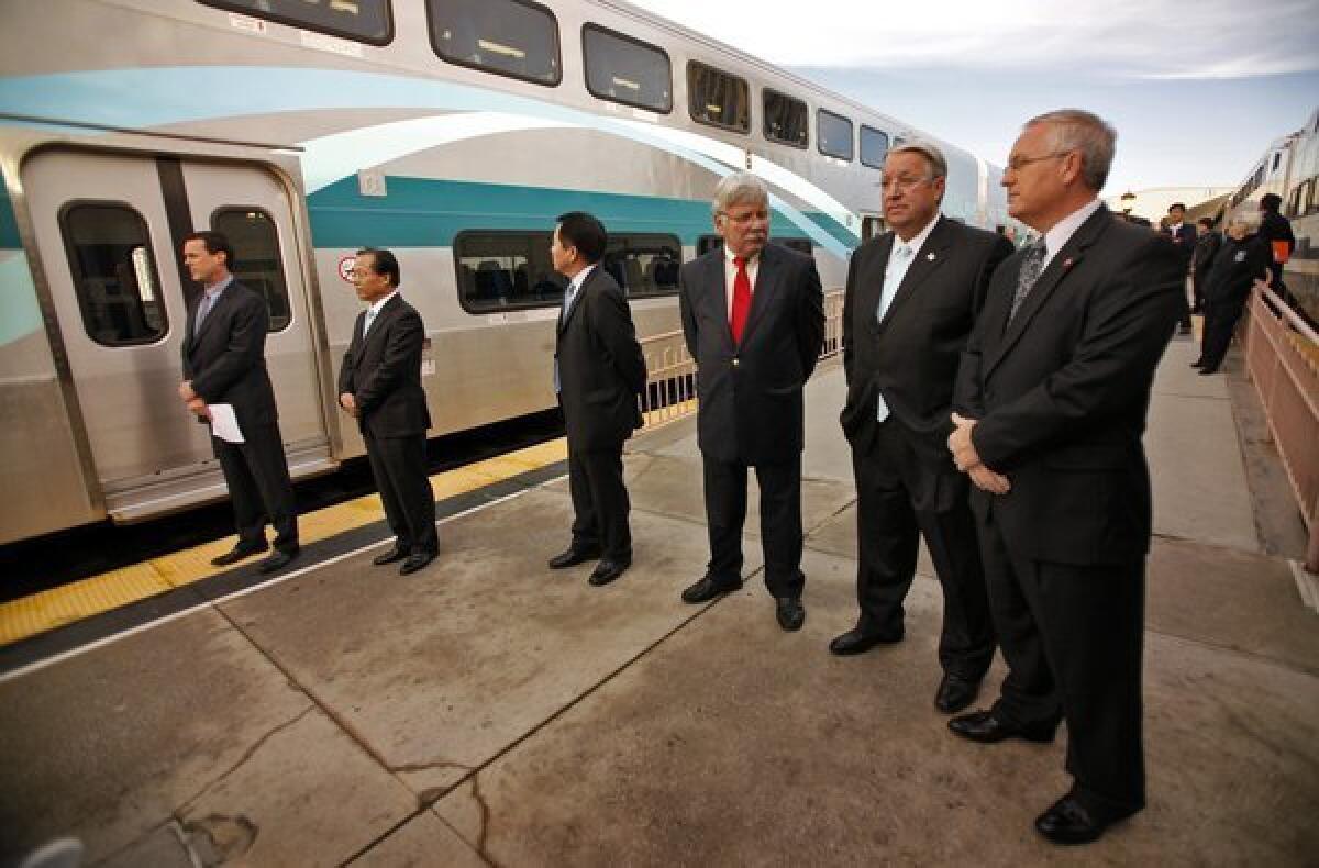 Metrolink officials unveil a new train car built by South Korean firm Hyundai in 2010.