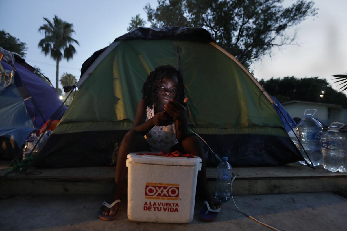 Maravilla, 10, and her family are living in a tent after leaving the Democratic Republic of Congo. They're waiting for a spot on the waiting list to request asylum in the U.S.