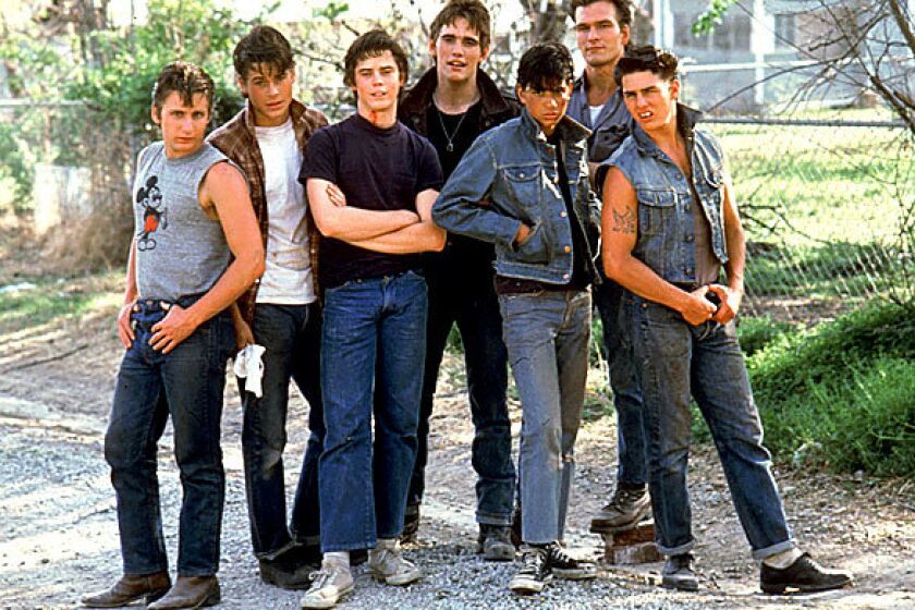 Patrick Swayze is shown with other cast members of the 1983 Warner Bros. film "The Outsiders," directed by Francis Ford Coppola. From left are Emilio Estevez, Rob Lowe, C. Thomas Howell, Matt Dillon, Ralph Macchio, Swayze and Tom Cruise.
