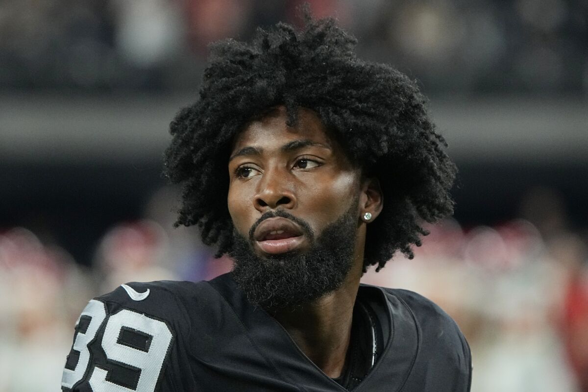 FILE - Las Vegas Raiders cornerback Nate Hobbs warms up before an NFL football game against the Kansas City Chiefs, Nov. 14, 2021, in Las Vegas. Hobbs resolved a misdemeanor speeding case Monday, May 2, 2022, with his attorney entering a no-contest plea on his behalf and paying a $250 fine. (AP Photo/Rick Scuteri, File)