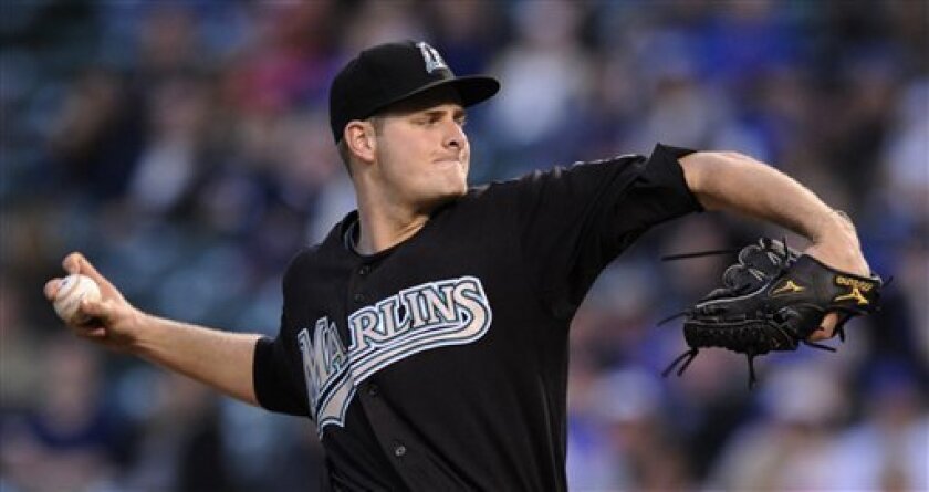 Florida Marlins starting pitcher Chris Volstad delivers against the Chicago Cubs in the first inning during a baseball game in Chicago, Thursday, April 30, 2009. (AP Photo/Paul Beaty)