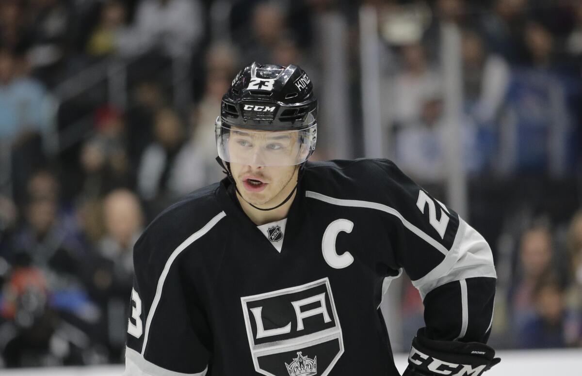 Kings captain Dustin Brown watches during the second period of an NHL hockey game against the Ducks in 2014.