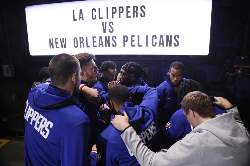 Los Angeles Clippers gather before the start of their play in game against New Orleans Pelicans Friday, April 15, 2022 in Los Angeles, CA.(Robert Gauthier / Los Angeles Times)