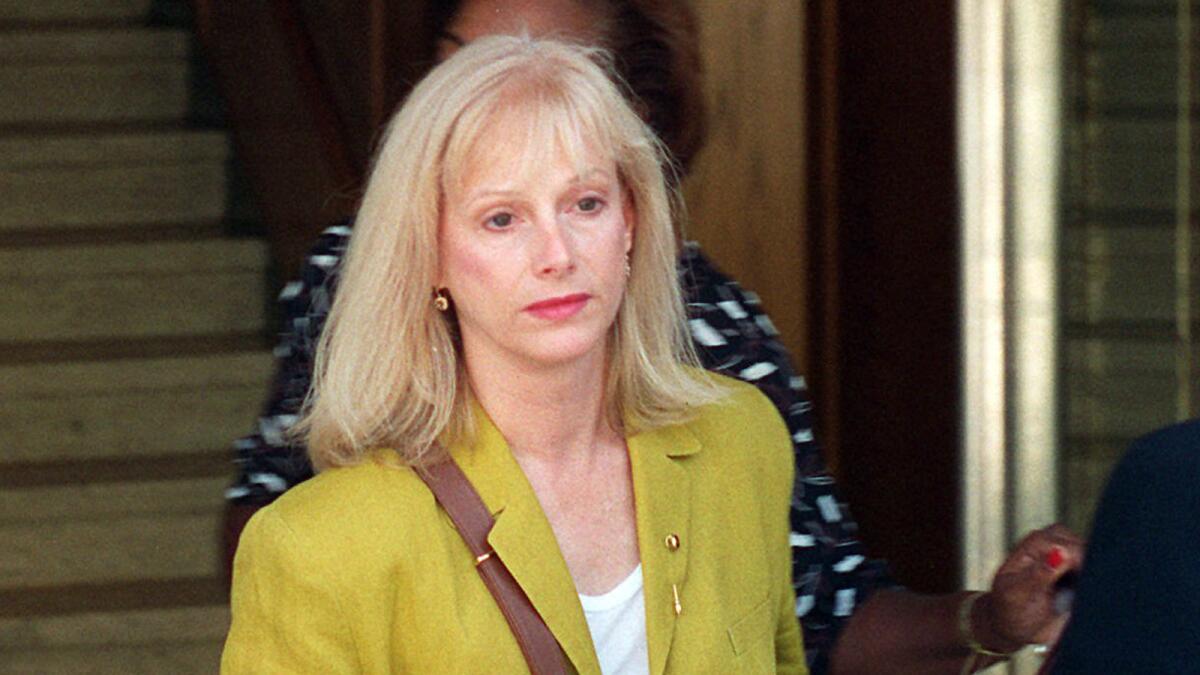 Sondra Locke leaves court in Burbank after opening statements in a 1996 civil suit against Clint Eastwood.