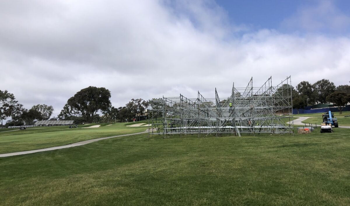 Bleachers are pictured under construction at Torrey Pines Golf Course along the fairway on the South Course's 17th hole.