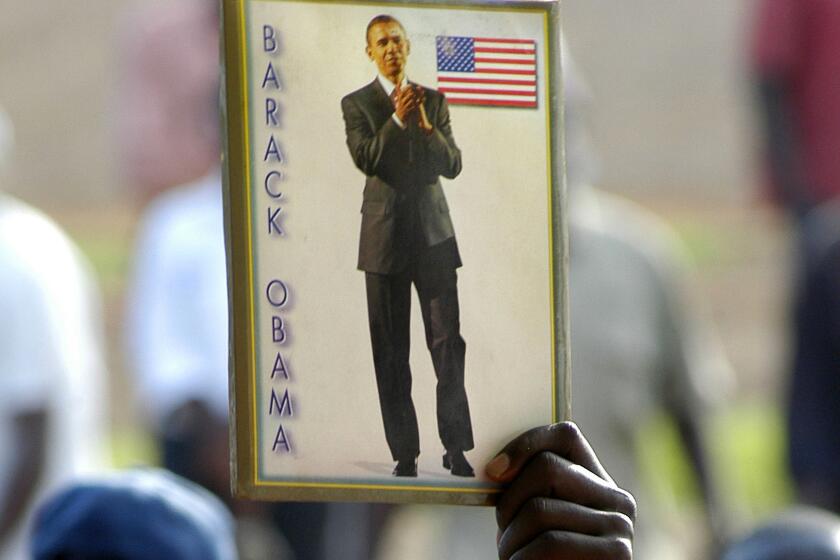 Kenyan's in Kisumu, Western Kenya, Wednesday Nov. 5, 2008, celebrate the victory of president–elect Barack Obama.