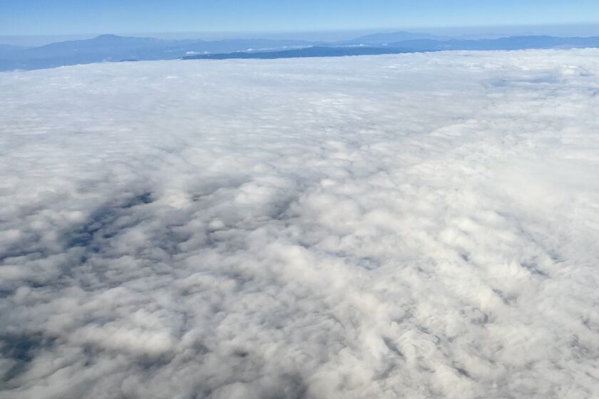 San Diego County was shrouded by a thick marine layer for most of Monday.