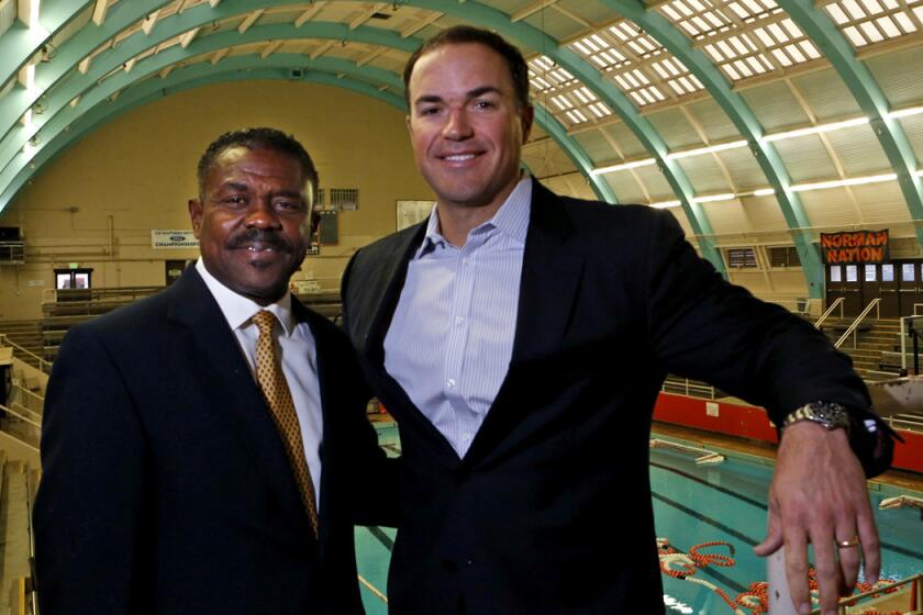 Principal Carter Paysinger, left, and Andrew Kline at the Beverly Hills High swim gymnasium.