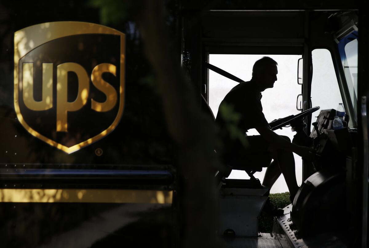 UPS Store Inc. said more than 100,000 customer transactions could have been exposed by a "limited malware intrusion" from January to this month. Above, a UPS driver in Cumming, Ga.