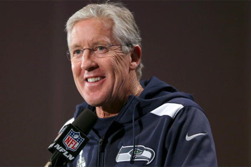 Seattle Coach Pete Carroll addresses the Super Bowl media Monday in Jersey City, N.J.