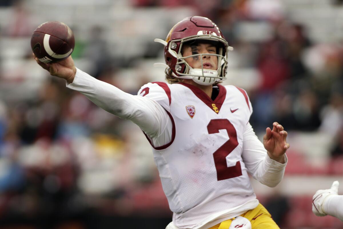 USC quarterback Jaxson Dart throws a pass 