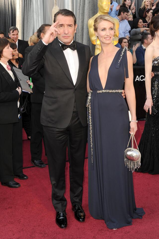 Lead actor Oscar winner Jean Dujardin of "The Artist" and actress-wife Alexandra Lamy.