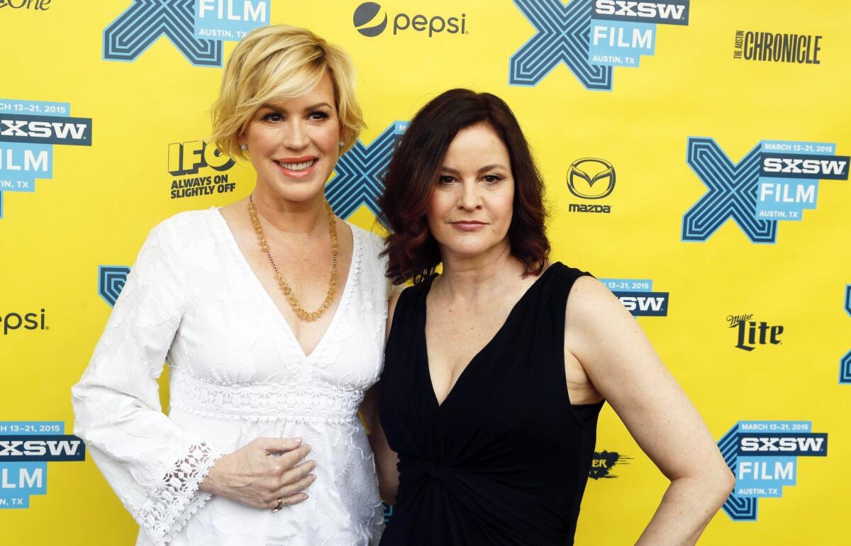 Molly Ringwald, left, and Ally Sheedy walk the red carpet for the 30th anniversary screening of "The Breakfast Club" during the South by Southwest film festival.