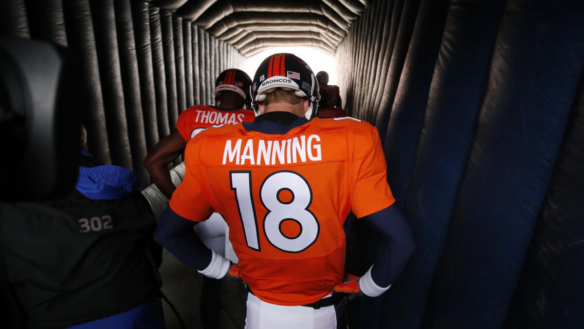 Denver Broncos quarterback Peyton Manning waits to take the field for an AFC divisional playoff game against the Indianapolis Colts on Jan. 11.