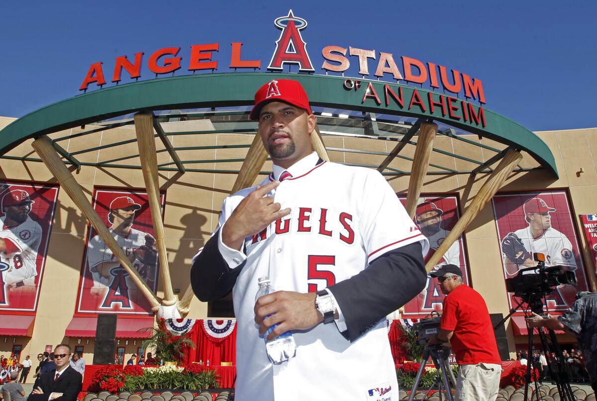 Albert Pujols wears his new jersey after an introductory news conference Dec. 10, 2011, at Angel Stadium.