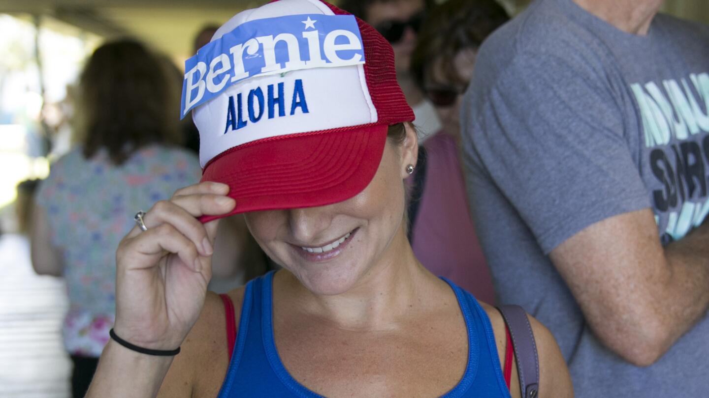 Hawaii voter Noelle Giamblvo shows off her Bernie Sanders's swag while waiting in line at the Hawaii caucus at Kailua Intermediary School.