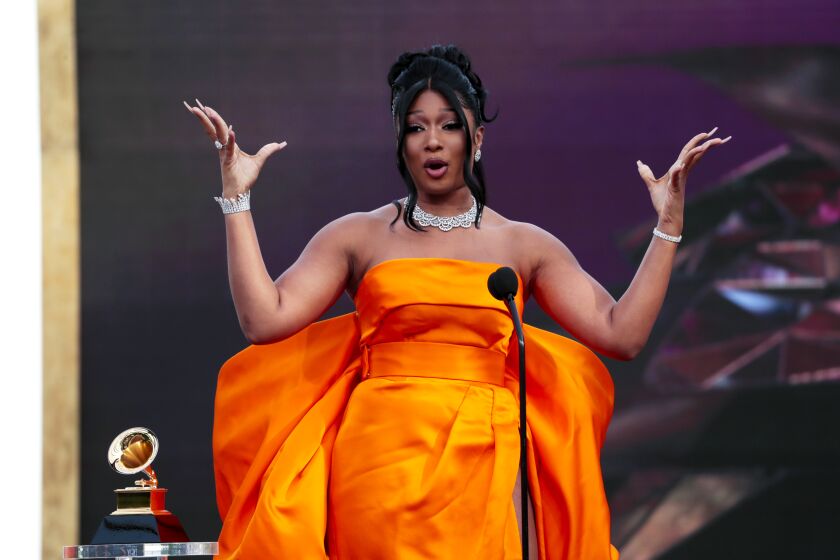 Megan Thee Stallion accepts the award for Best New Artist at the 63rd Grammy Award outside Staples Center.