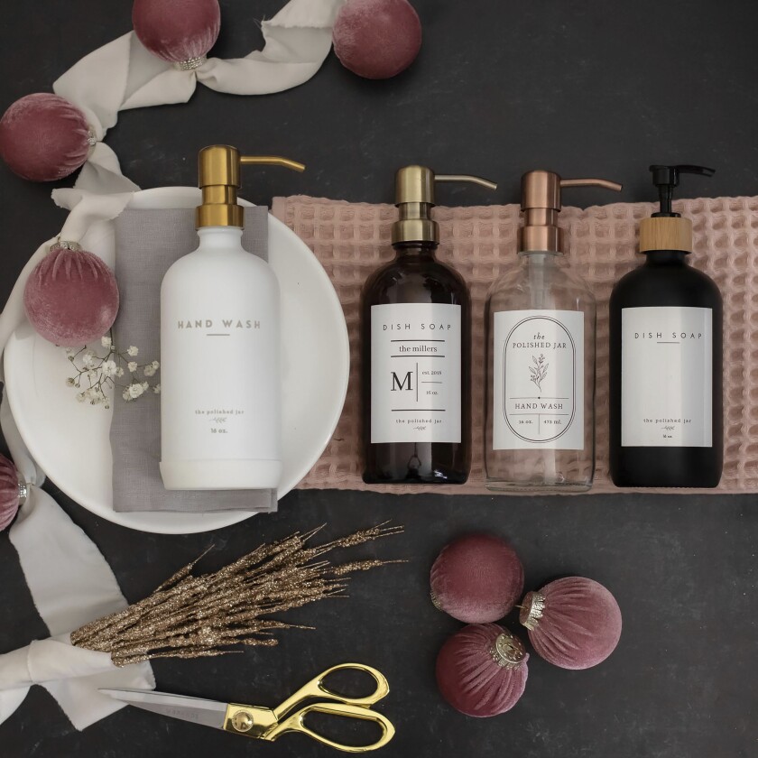 Reusable bottles for products like soap and lotion are displayed.