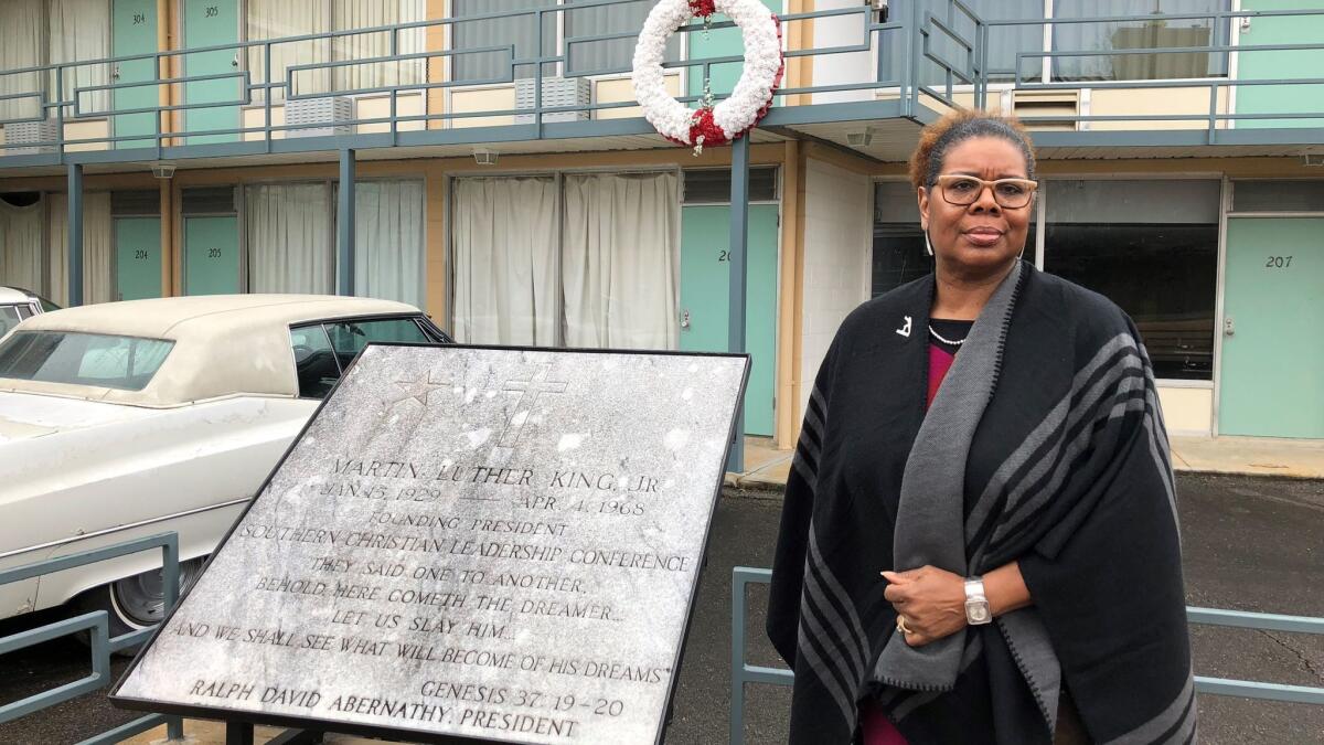 Terri Lee Freeman stands in front of the balcony of the old Lorraine Motel in Memphis, Tenn., where Martin Luther King Jr. was fatally shot. Freeman is president of the National Civil Rights Museum at the Lorraine Motel.