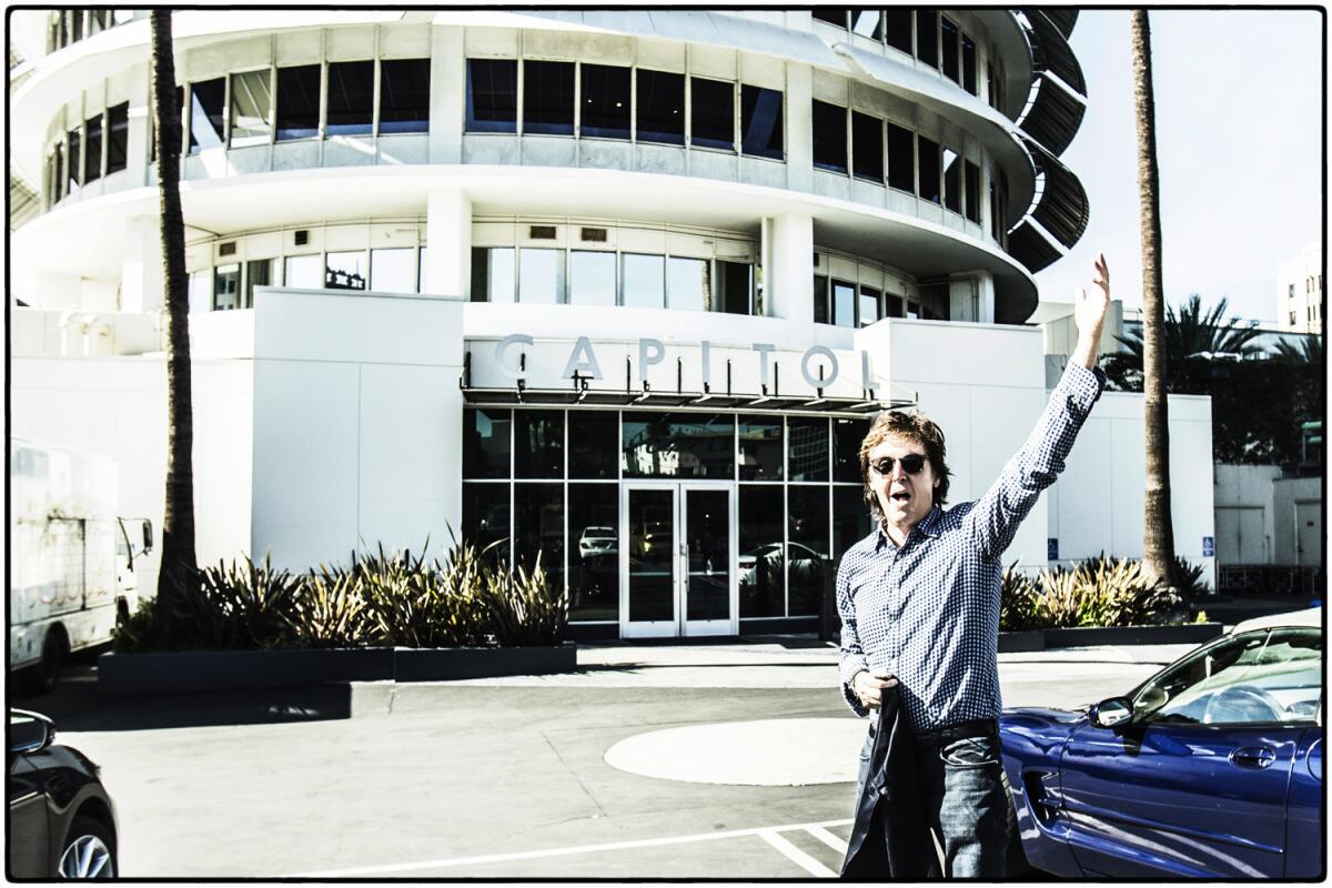 Paul McCartney, shown outside the Capitol Records Tower in Hollywood, has renewed his relationship with Capitol, returning to the label that launched the Beatles career in the U.S. in the 1960s.