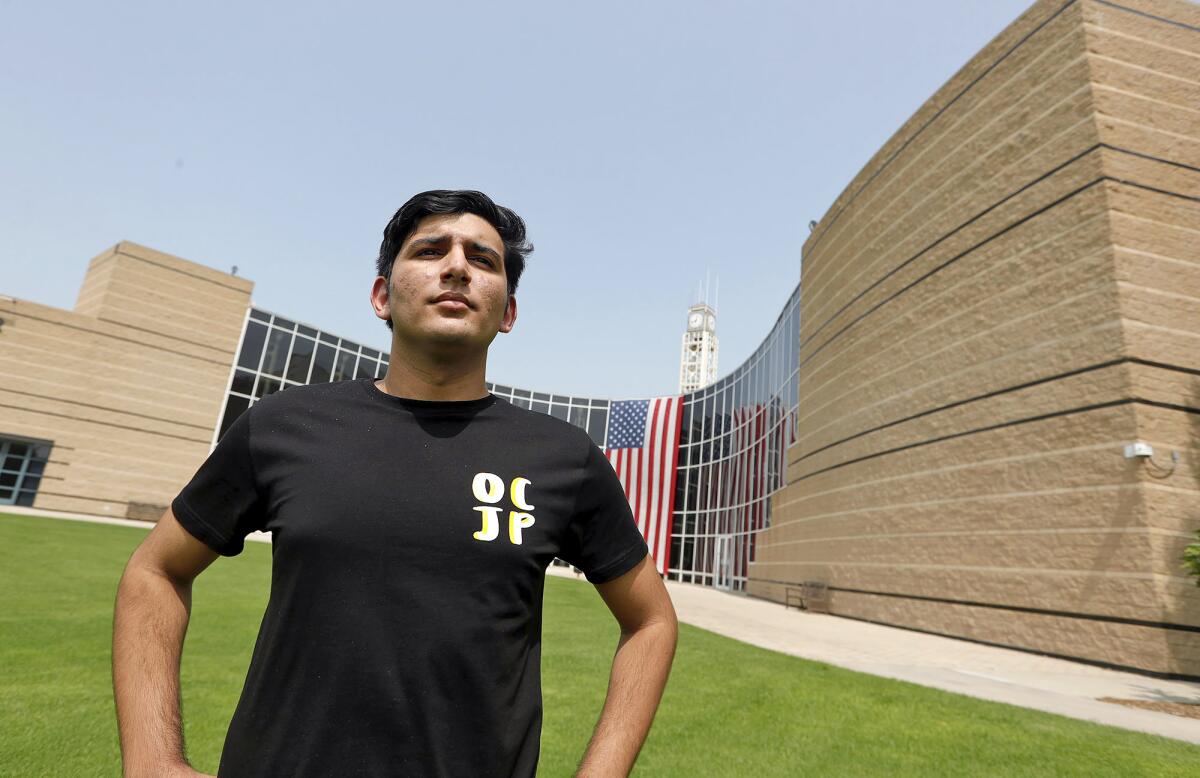 Arush Mehrotra stands at the Irvine Civic Center on Sept. 14.